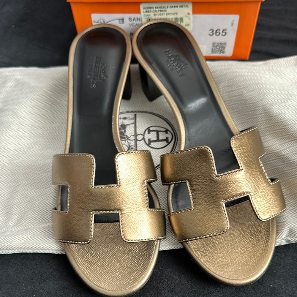 Hermes Gold Sandals / Signature H  
Worn once 
Size 6.5 
Normal wear on bottom